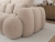 Beżowa sofa boucle z funkcją spania do salonu COTTON
