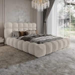 Designerskie łóżko tapicerowane o obłych kształtach ASILA