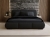 Czarne łóżko tapicerowane w stylu loft boucle COSE